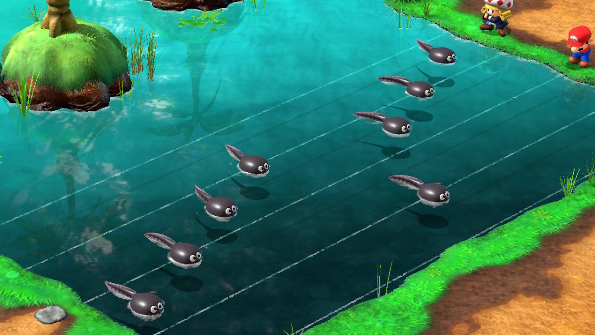 Tadpoles lined up against a music staff in Super Mario RPG.
